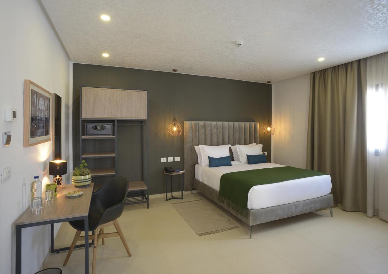 Maia Hotel Suites Tunis Exterior photo A room at the hotel