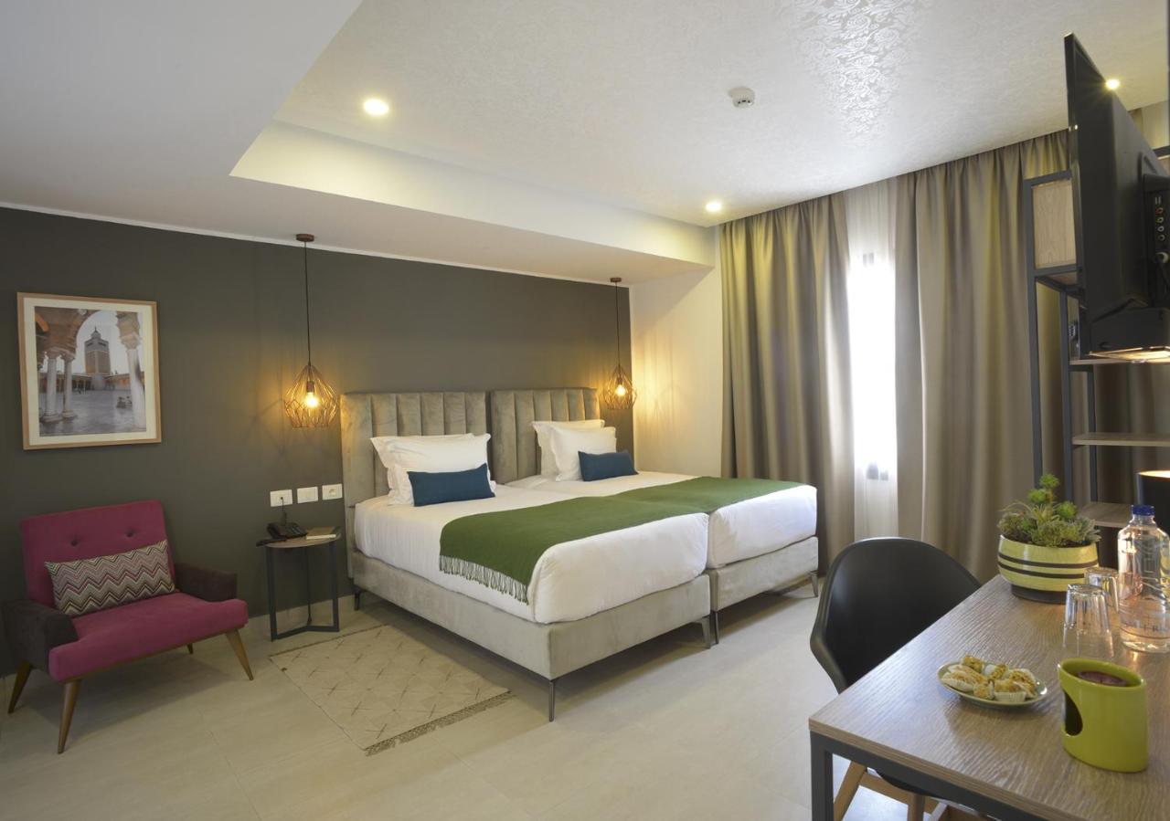 Maia Hotel Suites Tunis Exterior photo A room at the hotel