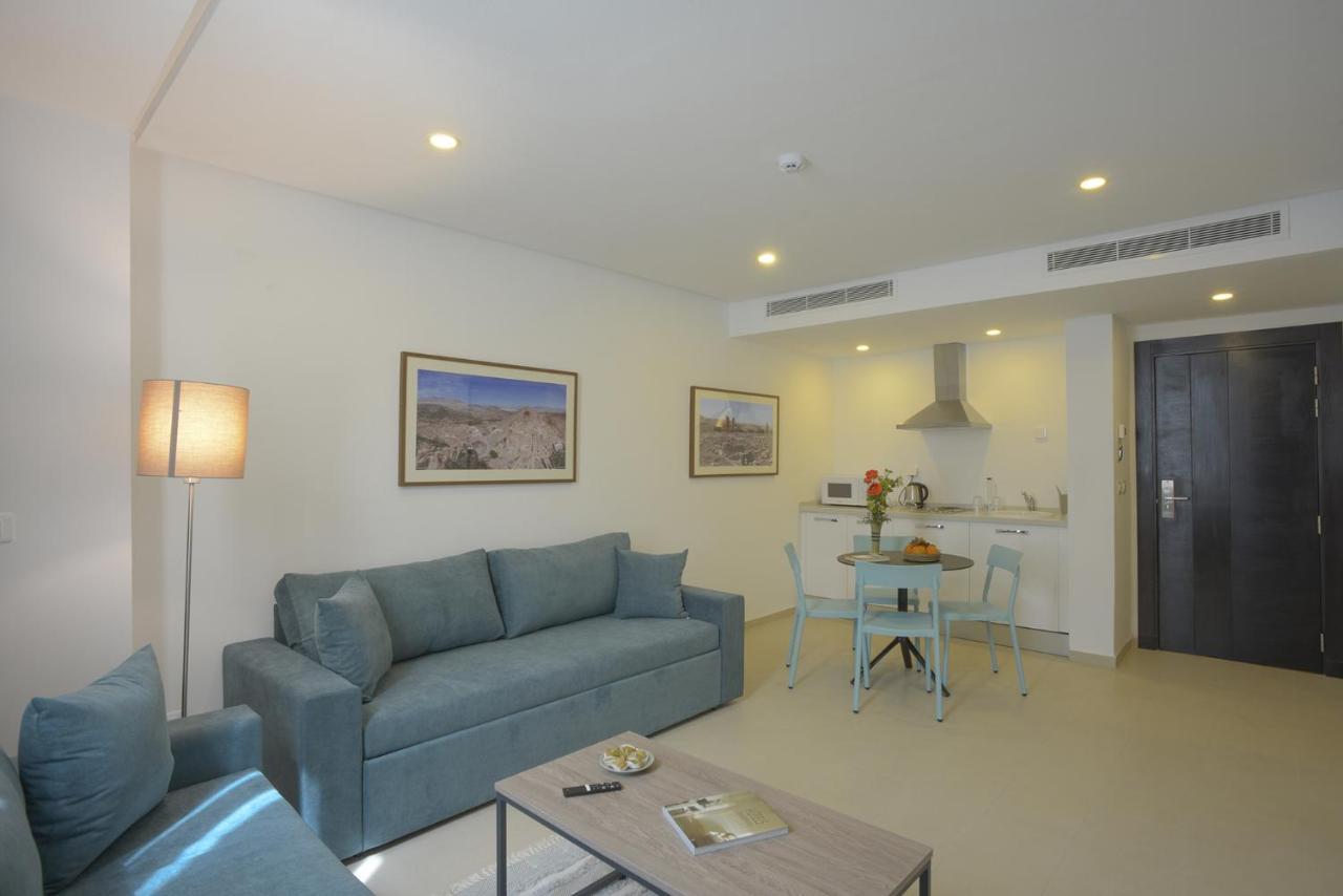 Maia Hotel Suites Tunis Exterior photo A living room in a typical apartment