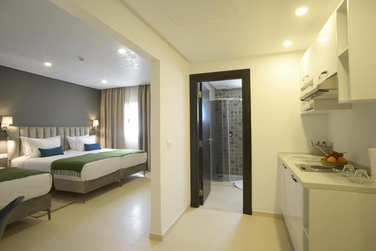 Maia Hotel Suites Tunis Exterior photo A typical room at the hotel