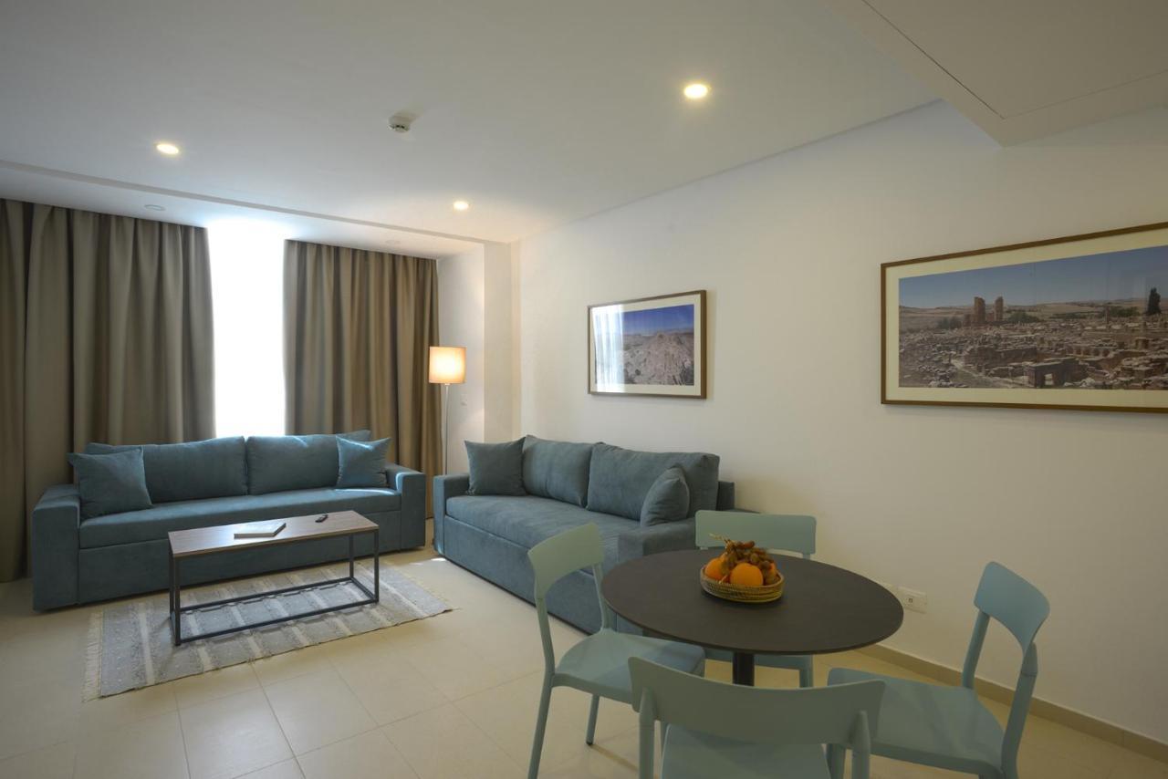 Maia Hotel Suites Tunis Exterior photo A living room in a typical apartment