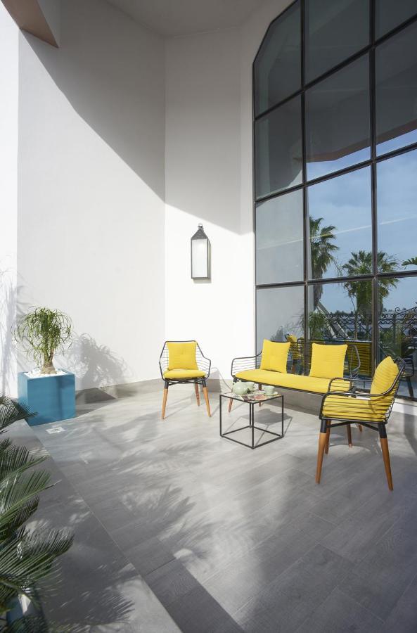 Maia Hotel Suites Tunis Exterior photo Outdoor furniture
