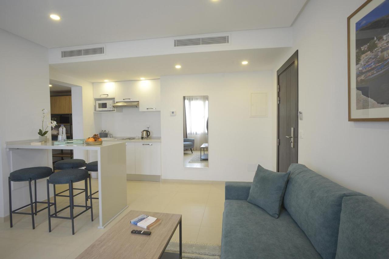 Maia Hotel Suites Tunis Exterior photo A living room in a serviced apartment in Dubai, United Arab Emirates